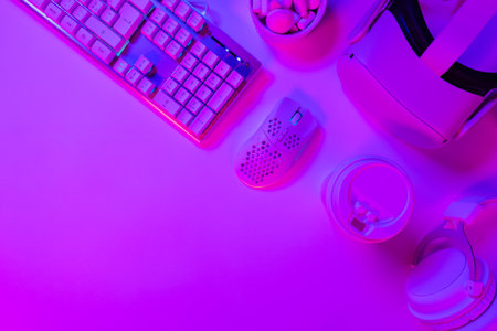 Keyboard with mouse and cup on gaming deskの写真素材