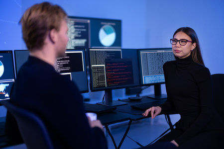 Professional and confident cyber security team working to prevent security threats, find vulnerability and solve incidentsの写真素材