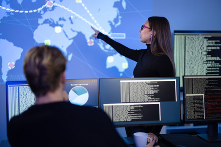 Professional cyber security team working to prevent security threats, find vulnerability and solve incidentsの写真素材