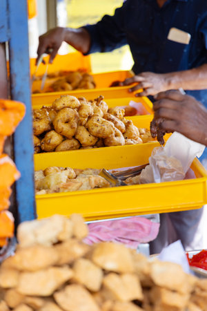 Street food vendor selling fried snacks in Asiaの写真素材