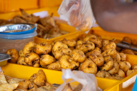 Delicious fried snacks at a street food stall in Asiaの写真素材