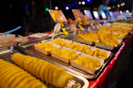 Authentic Street Food Display at a Vibrant Night Market in Thailandの写真素材