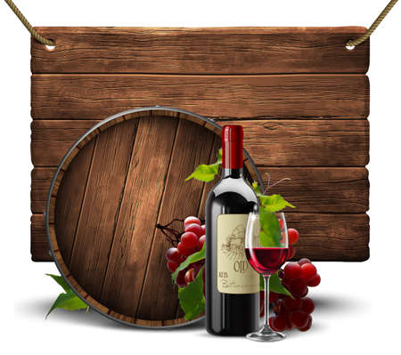 A bottle and a transparent glass with red wine twined with a vine on a wooden wine barrel background.の写真素材