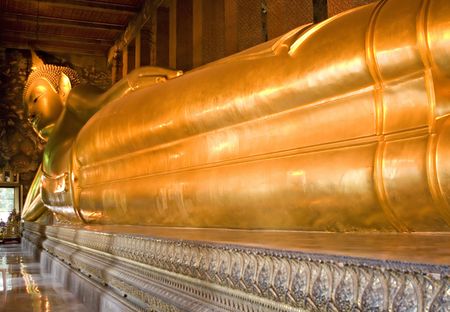 The reclining Buddha in Wat Pho temple, Thailandの写真素材