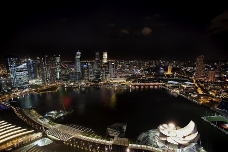 Night scene of financial district,Singapore. From the river.の写真素材