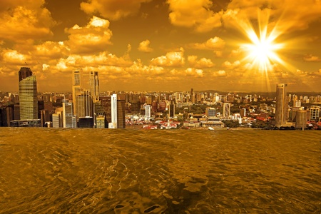 Singapore from swimming pool area on a skyscraper rooftopの写真素材