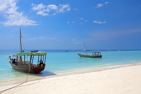 Crystal clear waters at Zanzibar beach in Tanzaniaの写真素材