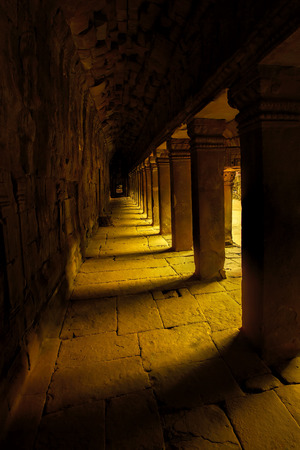 Sunrise over the Ta Phrom temple in Angkor, Cambodiaのeditorial素材