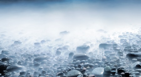 Background of water and  stones at Moelenの写真素材