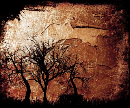 Silhouettes of trees on grunge backgroundの写真素材