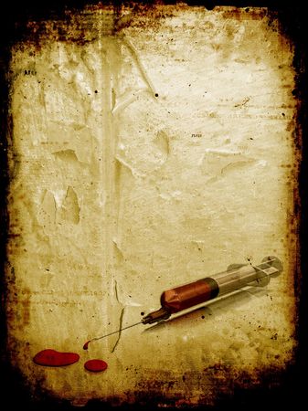 Syringe on a grunge backgroundの写真素材