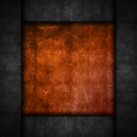 Grunge background with a perforated metal borderの写真素材