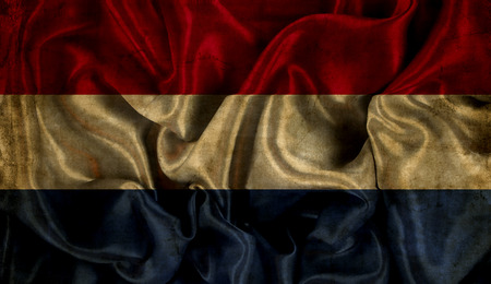 Netherlands flag background with folds and creases and a grunge effectの写真素材
