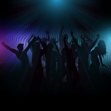 Silhouette of a disco crowd on an abstract background with light raysの写真素材