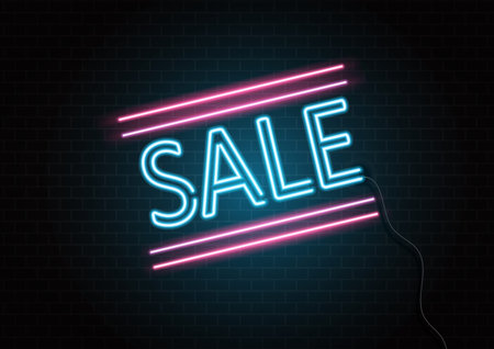 Neon glowing sale sign on a dark brick wall textureの写真素材