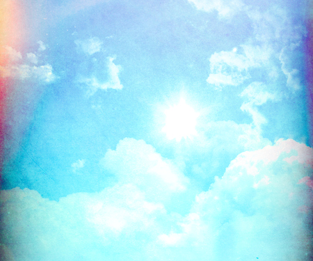3D render of a blue sky with fluffy white cloudsの写真素材