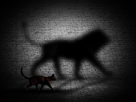3D render of a cat walking with lion shaped shadow against a brick wallの写真素材