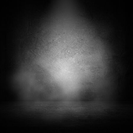 3D render of a grunge interior with smoke in spotlightの写真素材