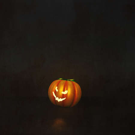 3D render of a Halloween background with pumpkin in grunge interiorの写真素材