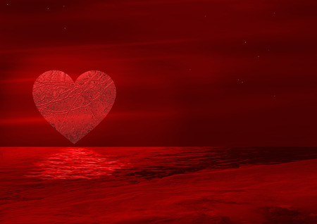 Glass heart moon over the oceanの写真素材