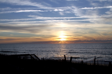 A spectacular sunrise onTopsail Beach, North Carolina with the foreground in silouette の写真素材