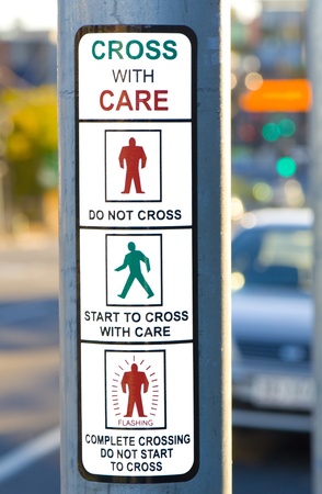 Cross With Care Sign at Traffic Lightsの写真素材