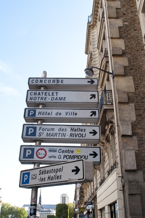 Paris, France, August 16, 2011 - Signs showing directions to various Paris landmarks.のeditorial素材