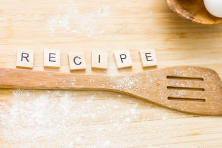 the word recipe is laid out on the tableの写真素材