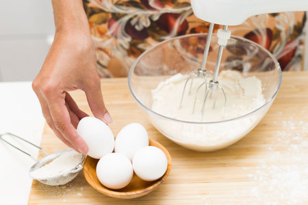 in a Cup of dough. Flour, eggs, salt, mixer. Preparation of the bread
