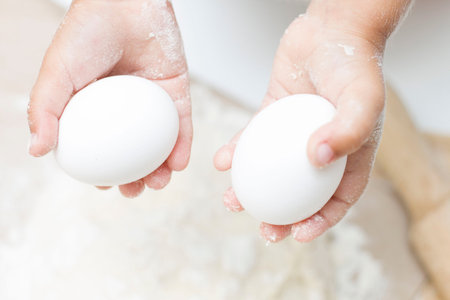 TWO EGGS IN YOUR HANDS