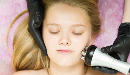 Radiofrequency facelift. Facial care and rejuvenation. Increased tone of the epidermis. RF liftingの写真素材