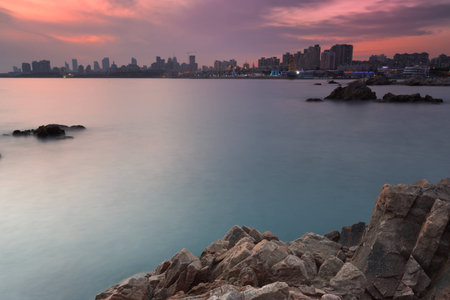 Seaside city at dusk