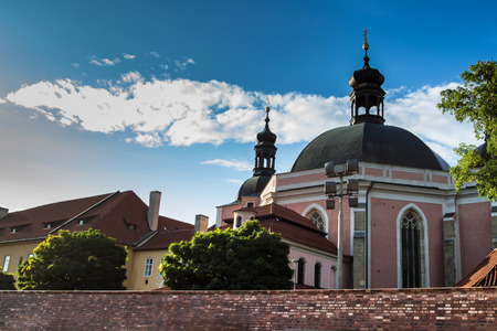 Summer sunny picture of the Church of the Assumption of the Virgin Mary and St. Charles the Great with few clouds.の写真素材