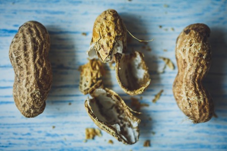Fresh peanuts in shell top view backgroundの写真素材