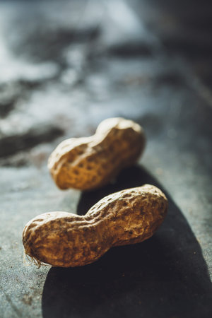 Fresh peanuts in shell top view background