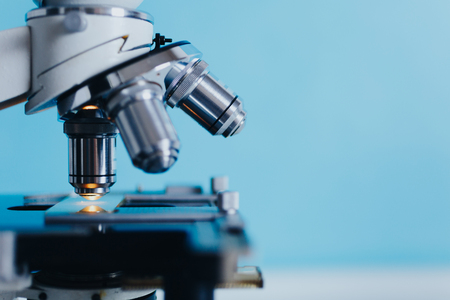 Powerful scientific laboratory microscope with multiple lenses.の写真素材