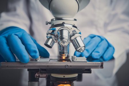 Close-up shot of microscope with metal lens.