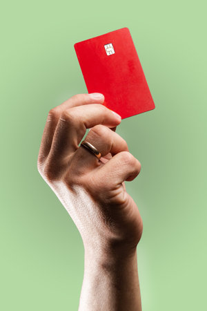 Template of credit card in the mans hand.