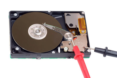 diagnostic and repair magnetic computer hard disk, mass memory on white background