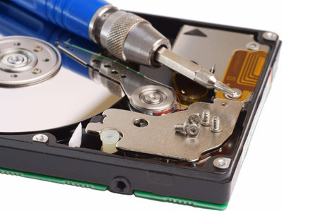 diagnostic and repair magnetic computer hard disk, mass memory on white background