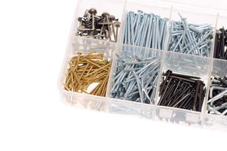 nails in box isolated on white backgroundの写真素材