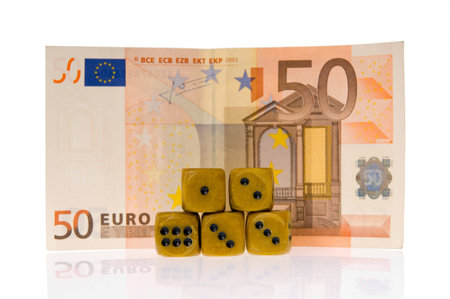 euro money  and stack dice isolated on whiteの写真素材