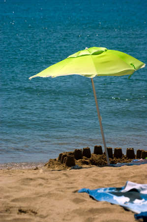 green parasol on the beach. Sunshades.
の写真素材