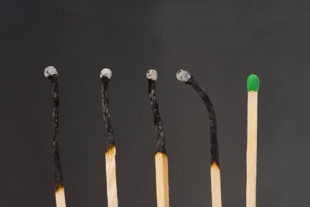 Close up shot of matches isolated on white on black