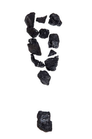 exclamation mark - coal, carbon nugget isolated on white backgroundの写真素材
