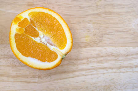 orange on  wooden boardの写真素材