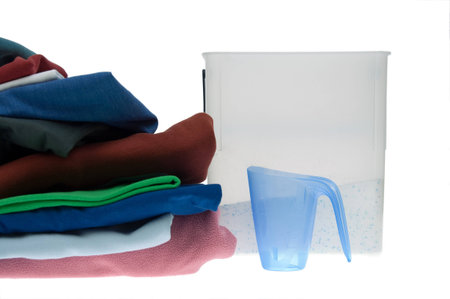 Pile of dirty clothes for the laundry - isolated on white