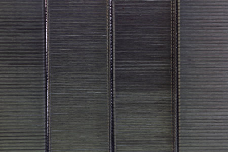 Staples metal grey texture background 