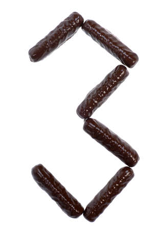 number, figure -  chocolate sticks isolated on whiteの写真素材