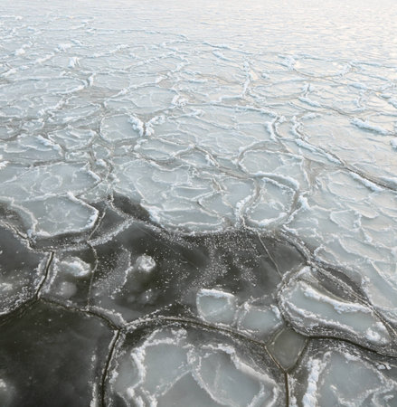 yellow Sunset on the sea - ice - floe. Poland, Gdynia